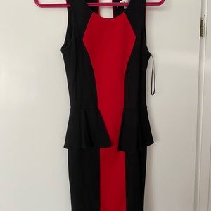 Peplum sides- thicker stretch just above knee body con